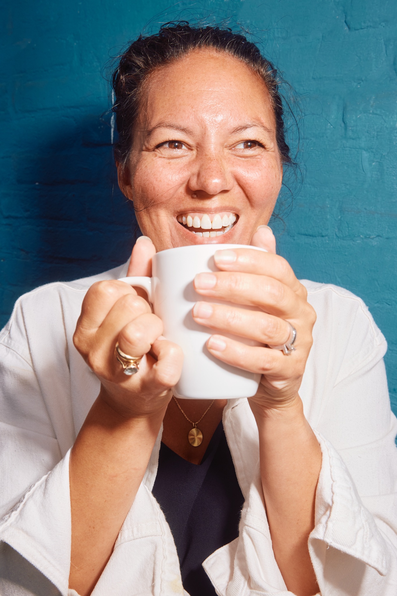 Happy team member with coffee cup Happy team member with coffee cup